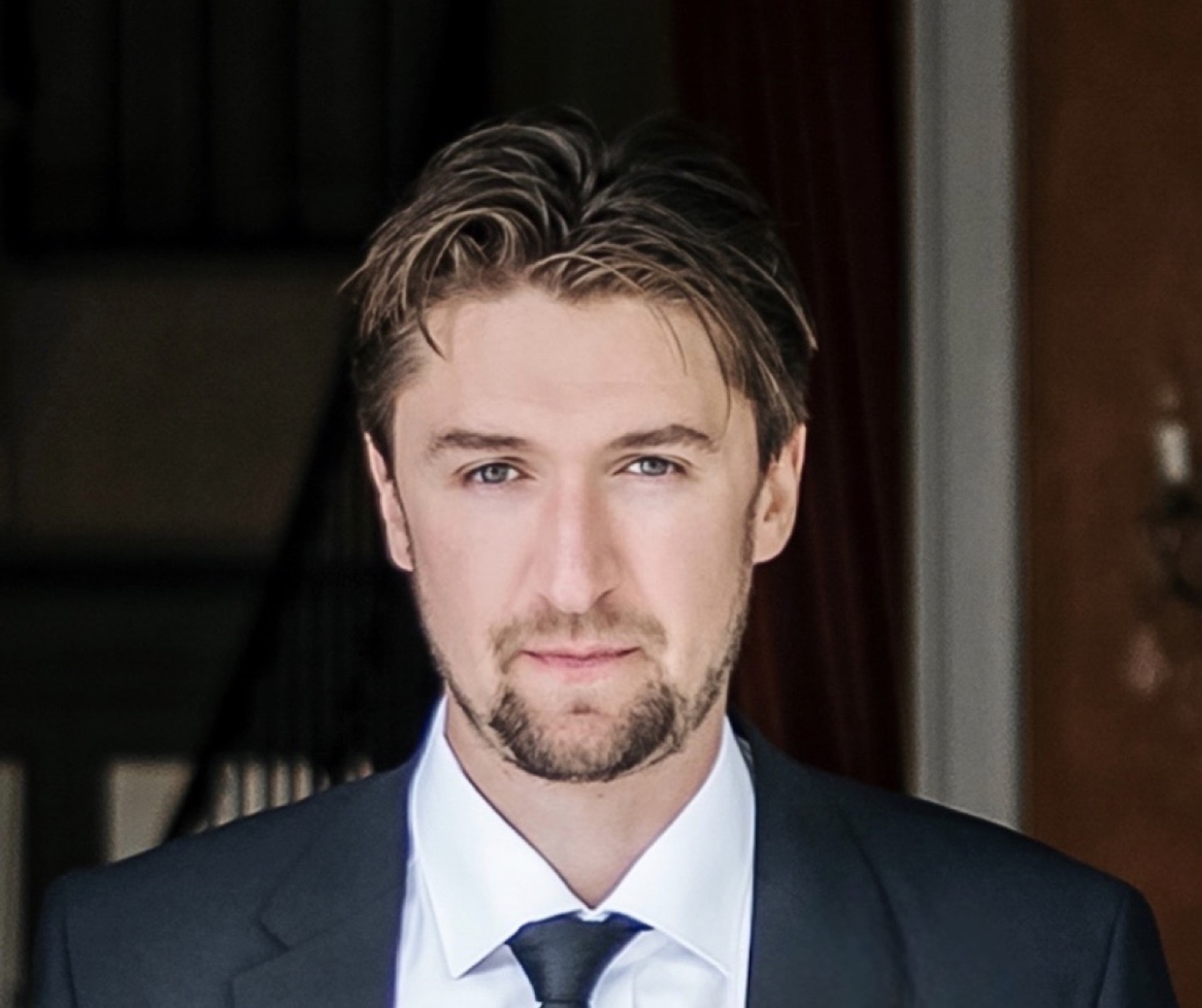 Professional headshot of Benjamin Freeman.