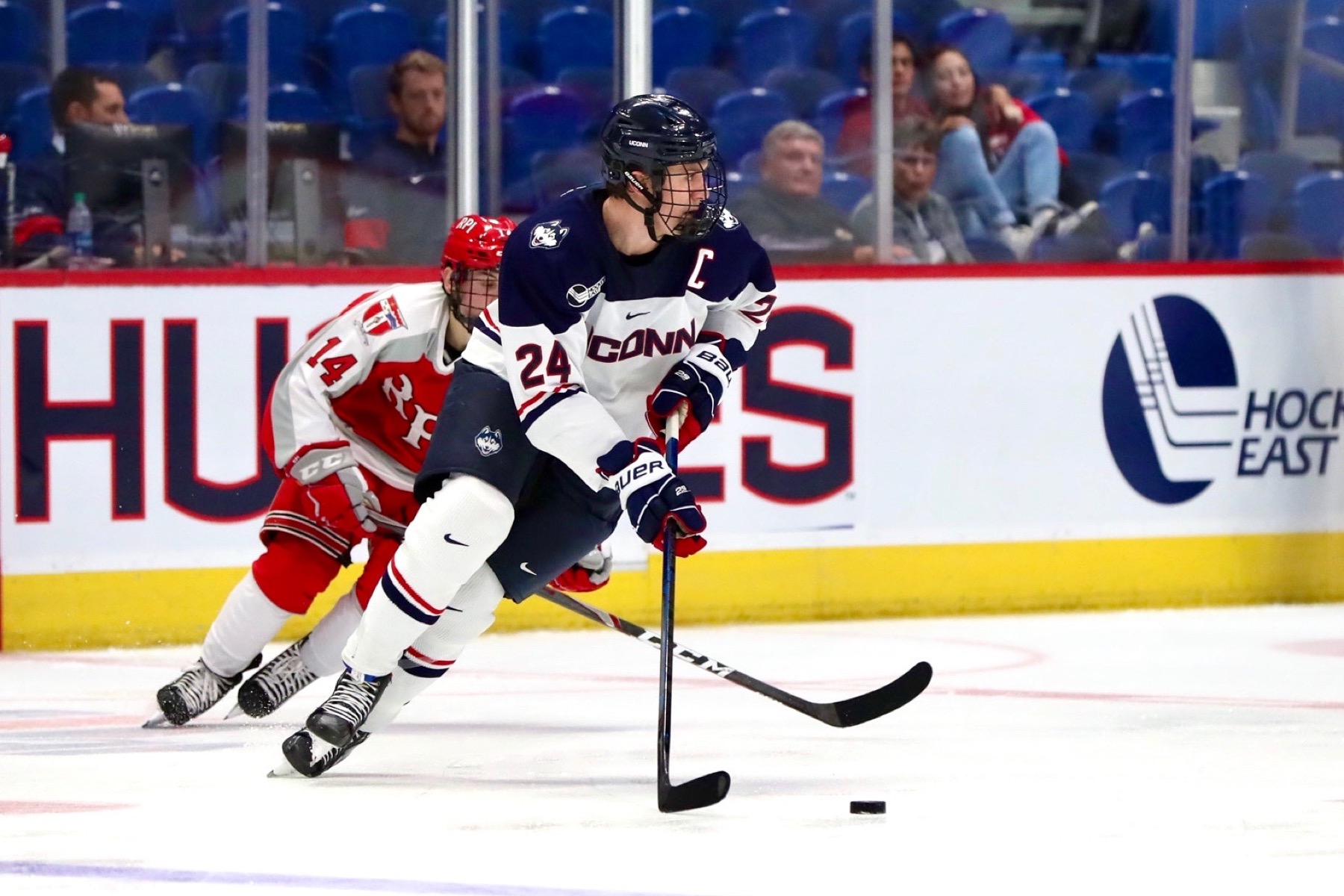 Benjamin Freeman playing hockey at UConn.