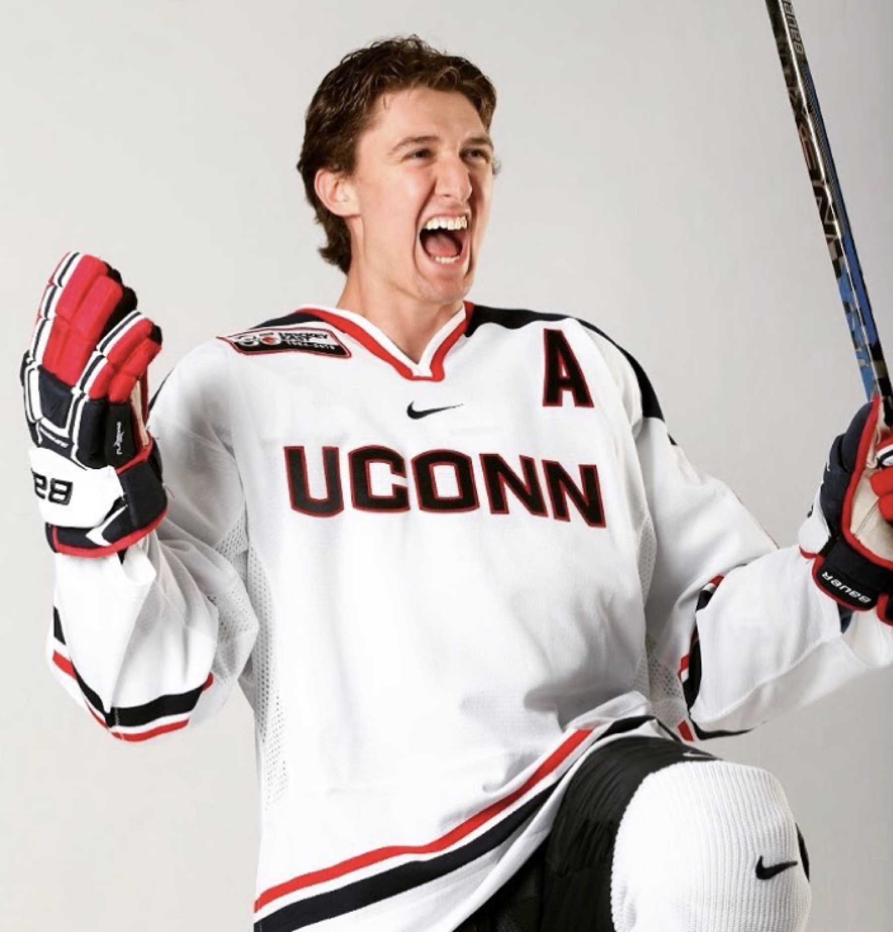 Benjamin Freeman in a UConn hockey studio photo.