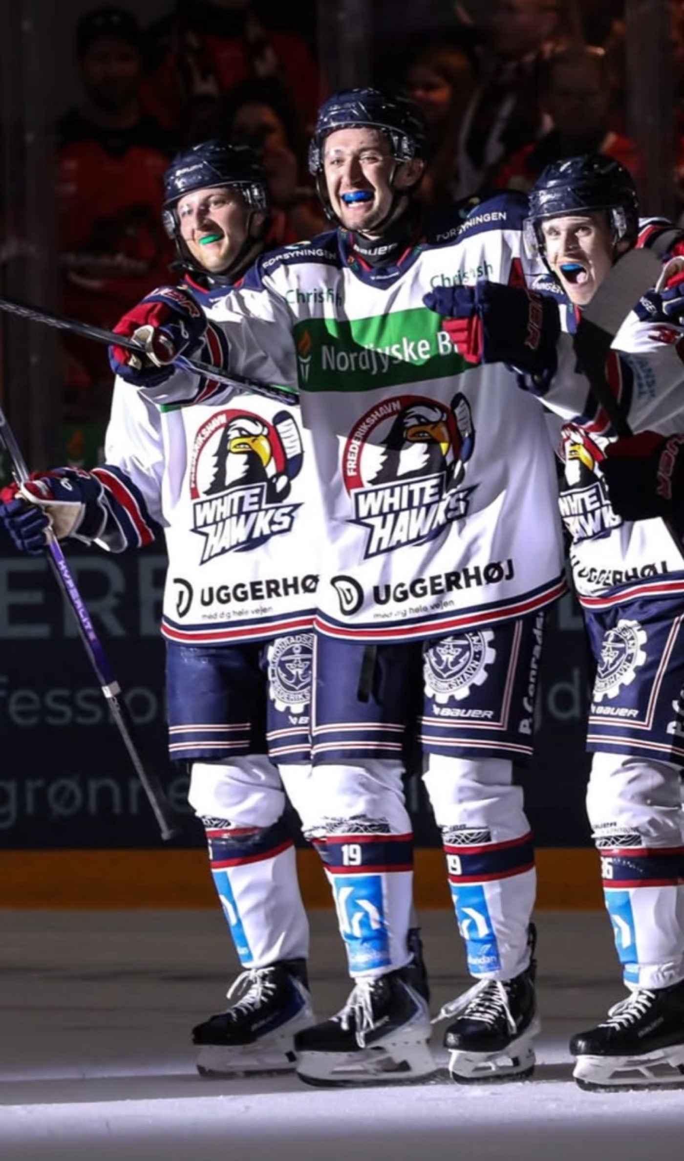 Benjamin Freeman celebrating with Frederikshavn White Hawks teammates.