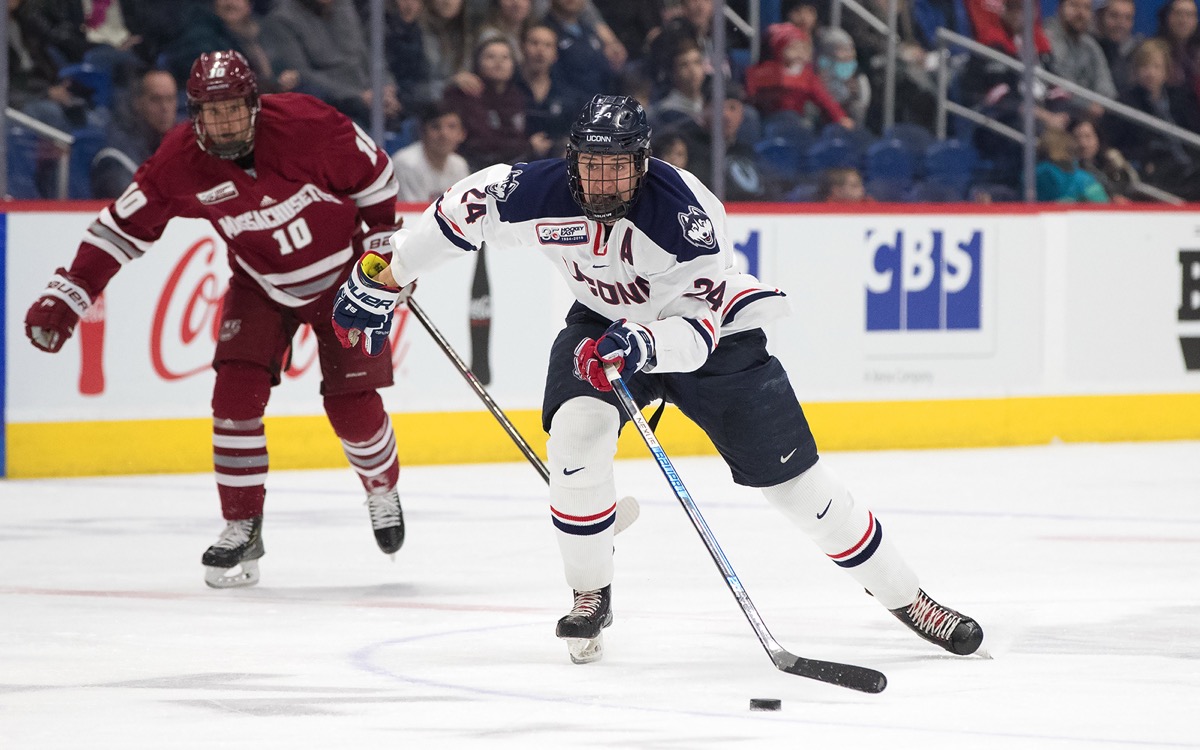 Benjamin Freeman skating for UConn hockey.